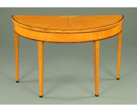 A George III satinwood demi lune turnover top card table, with shell inlay and fanned top, with rosewood banded edge and rais