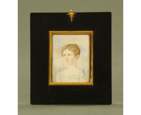 A 19th century rectangular portrait miniature of a young girl, 7.5 cm x 6 cm in gilt frame with brass hanger.
