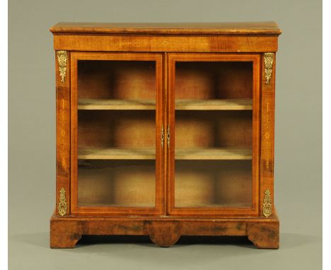 A Victorian walnut vitrine, with moulded edge above a pair of glazed boxwood strung drawers and raised on bracket feet.  Heig