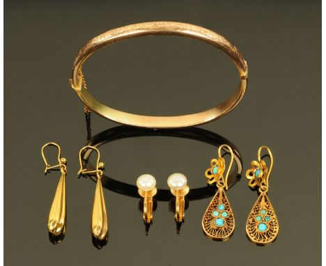 A rose gold coloured metal bangle together with a pair of 9 ct gold earrings, a pair of turquoise and gold coloured earrings 