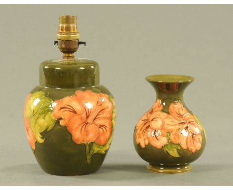 A Moorcroft green ground pottery table lamp base and similar vase, light fitting height excluding fitting 16 cm.