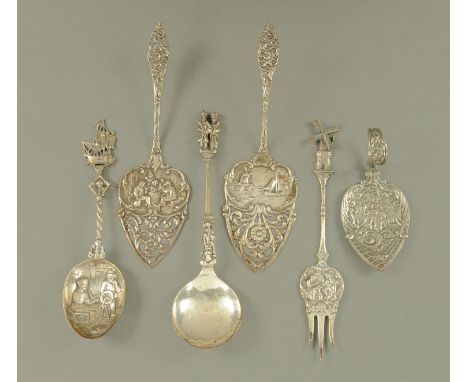 A collection of six large Dutch silver cake servers, spoons, fork etc.  Longest 20 cm. CONDITION REPORT: Weight 291 grams.