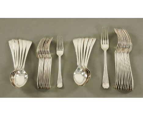 A part canteen of silver cutlery, Sheffield 1911, comprising 12 dessert spoons, 12 table forks, 11 dessert forks.  Width 1815