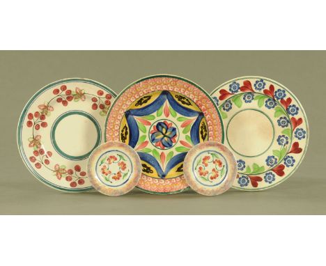 Five 19th century spongeware plates, three large and two small.  Largest diameter 22.5 cm.  CONDITION REPORT: All items in th