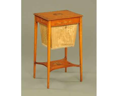 An Edwardian painted satinwood worktable, rectangular with moulded edge. sliding bag, tapered legs and raised shelf.  Width 4