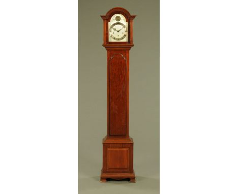 A mahogany longcase clock, with three train spring driven movement and silvered brass dial.  Height 175 cm, width 31 cm. COND