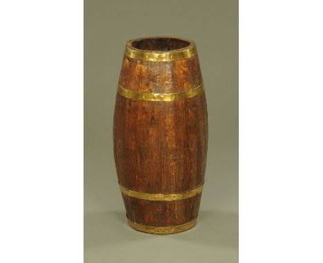 A 19th century brass bound barrel form stick stand.  Height 64 cm, top diameter 23 cm.