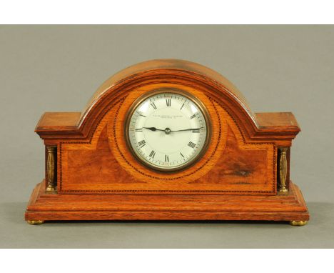 An Edwardian oak and pollard oak cased mantle clock by The Goldsmiths Company Cardiff, with single train movement, case width