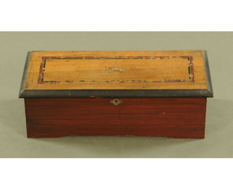 A 19th century Swiss musical box, with 14 cm comb playing ten airs.  Case width 46 cm. CONDITION REPORT: The music box does p