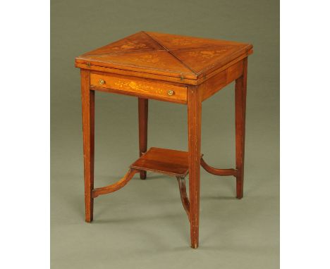 An Edwardian foliate marquetry square envelope card table, with single drawer and raised on tapered legs united by a raised s