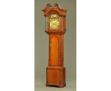 An early 19th century oak and mahogany crossbanded longcase clock with eight day striking movement by Caygill of Askrigg, the