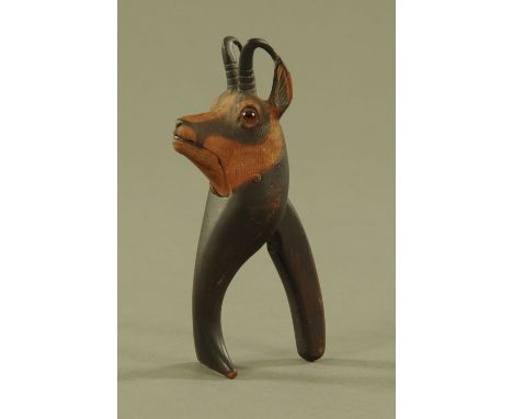 A 19th century Treen Black Forest type nutcracker in the form of a Chamois.  Length 18 cm.