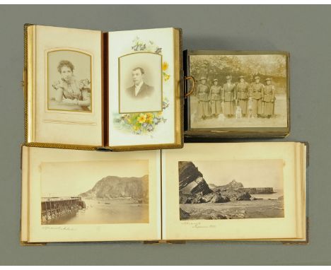 An early 20th century photograph album, containing some images of girl Guides, and postcards, photograph album late 19th cent
