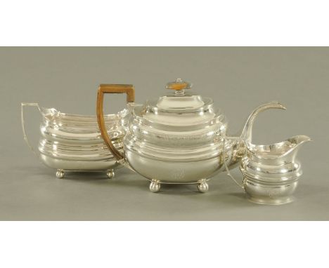 A George III silver tea service Dorothy Langlands Newcastle 1808, comprising bright cut engraved teapot, sugar basin and crea