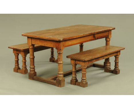 A pine refectory table, raised on turned legs with centre stretcher and with matching pair of benches.  Table length 163 cm, 
