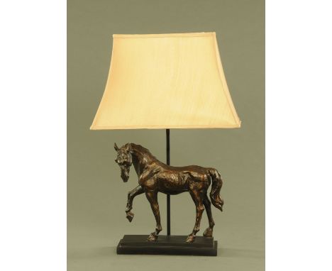 A simulated bronze table lamp in the form of a horse.  Height to top of ear 38 cm.
