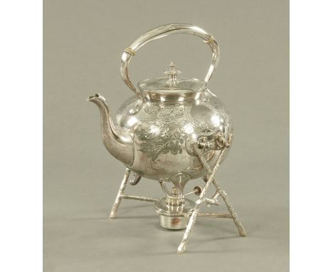 A Victorian plated spirit kettle on stand, foliate engraved and with stick form stand.