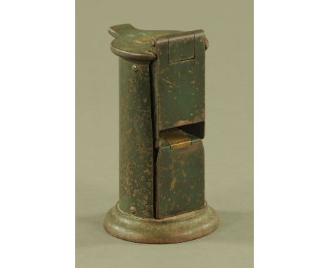A Blaylock of Carlisle cast iron ticket punching machine, green painted.  Height 25 cm, top diameter 12 cm.