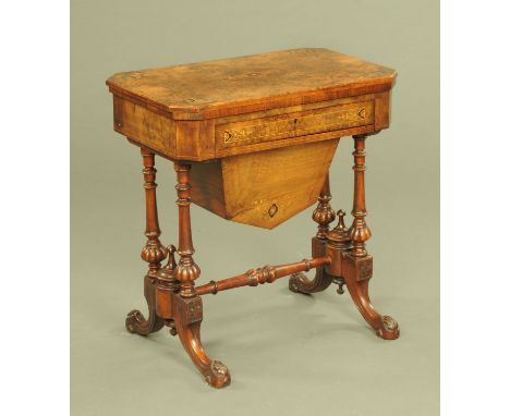 A Victorian walnut and Florentine marquetry turnover top combined games and worktable, with backgammon, cribbage and chessboa