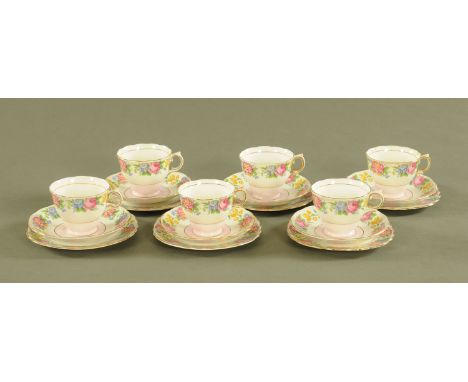 A Colclough tea service, 6 cups, 6 saucers and 6 plates, all decorated with roses.