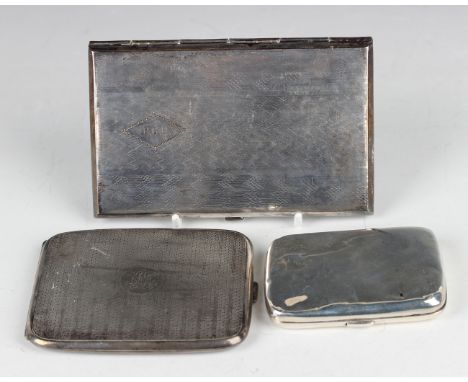 A Victorian silver curved rectangular cigarette case, Birmingham 1882 by David &amp; Lionel Spiers, length 8cm, a silver engi