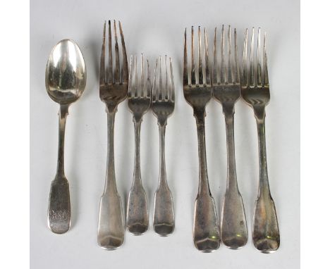 A George III Irish silver Fiddle pattern table fork and two matching dessert forks, Dublin 1806 by Samuel Neville, three silv