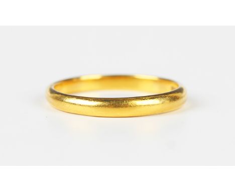 A gold wedding ring, detailed '22ct', weight 4.3g, ring size approx U1/2.Buyer’s Premium 29.4% (including VAT @ 20%) of the h