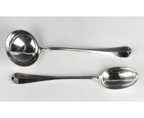 An Edwardian silver Hanoverian Rat Tail pattern serving spoon, Sheffield 1910, length 31cm, and a matched soup ladle, Sheffie