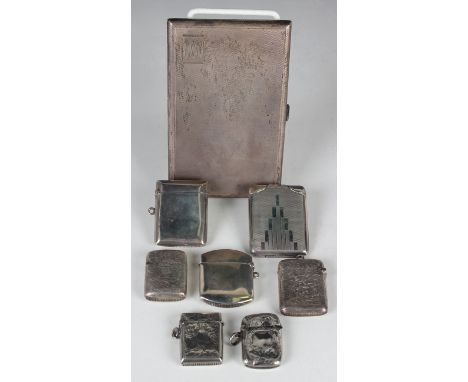 A George VI silver rectangular engine turned cigarette case, Birmingham 1946 by J.H. Wynn Ltd, length 14cm, together with sev