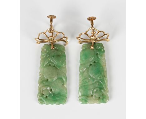 A pair of gold mounted jade pendant earrings, each tapered jade panel carved and pierced with fruit, the screw fittings detai