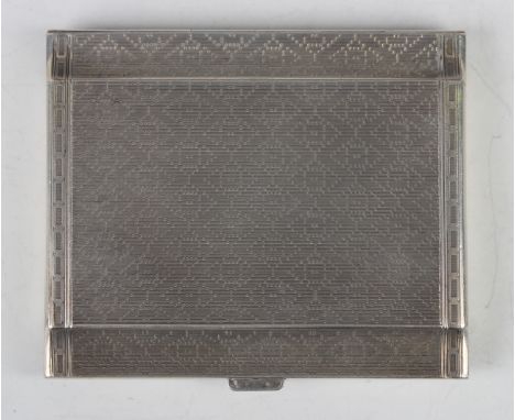 A George V silver rectangular cigarette case with engine turned decoration, import mark London 1925 by Cohen &amp; Charles, w