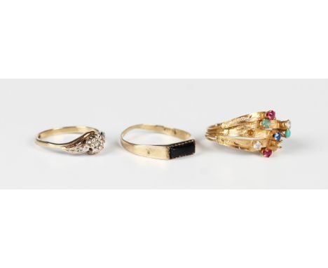 A Middle Eastern gold and varicoloured gem set five shank ring, weight 2.1g, (two gems lacking), a 9ct gold and diamond ring 