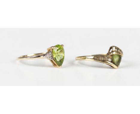 A 9ct gold ring, mounted with a trilliant cut peridot between colourless topaz set shoulders, ring size approx S, and another