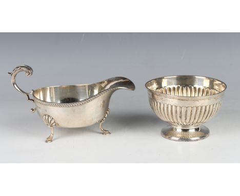 A late Victorian silver circular reeded sugar bowl on a flared circular foot, Sheffield 1899 by Mappin &amp; Webb, height 7cm