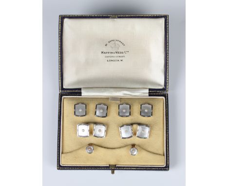 A gold, platinum, mother-of-pearl and seed pearl dress set, comprising a pair of cufflinks, four buttons and a pair of studs,