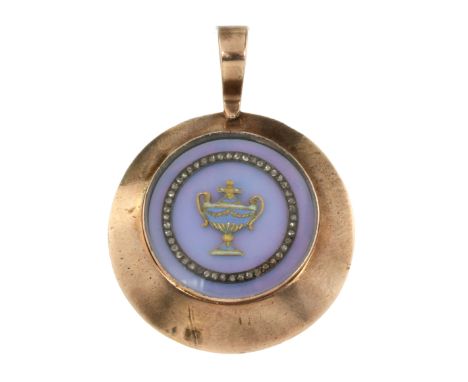 AN ANTIQUE DIAMOND MOURNING LOCKET, 19TH CENTURY in high carat yellow gold, one side with hinged lid inset with a black and w