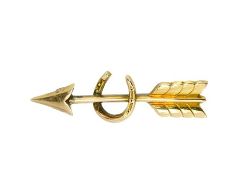 AN ANTIQUE HORSESHOE AND ARROW BROOCH in 15ct yellow gold, designed as an arrow, overlaid with a lucky horseshoe, full Britis