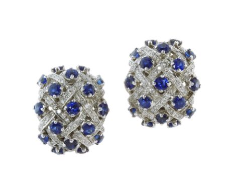 A PAIR OF BLUE SAPPHIRE AND DIAMOND HALF HOOP EARRINGS in white gold or platinum, each designed as a bombe half hoop with rou