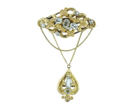 AN ANTIQUE AQUAMARINE MOURNING BROOCH, 19TH CENTURY in high carat yellow gold, set with round cut aquamarine surrounded by sc