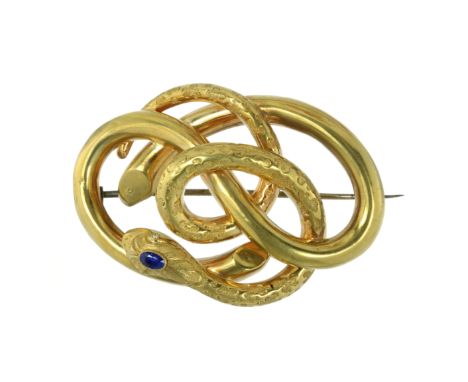 AN ANTIQUE SAPPHIRE SNAKE BROOCH, CIRCA 1900 in high carat yellow gold, designed as the body of a snake coiled around itself,