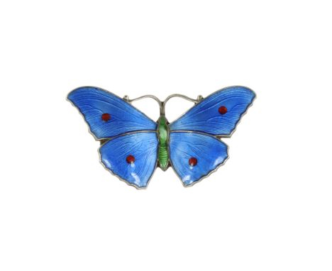 AN ANTIQUE ENAMEL BUTTERFLY BROOCH in sterling silver, designed as a butterfly, its body and wings jewelled with blue, green 