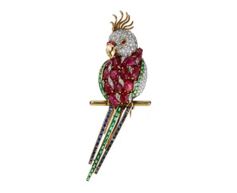 AN ANTIQUE RUBY, DIAMOND, EMERALD AND SAPPHIRE BIRD BROOCH, FRENCH CIRCA 1940 in high carat yellow gold, designed as a cockat