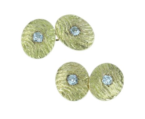 A PAIR OF DIAMOND CUFFLINKS in yellow gold each designed as two oval links with reticulated surfaces connected by belcher cha