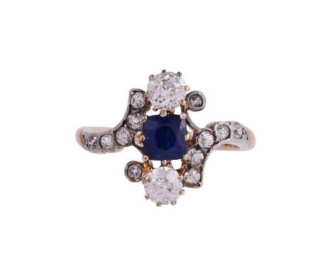 A RUSSIAN EARLY 20TH CENTURY SAPPHIRE AND DIAMOND RING CIRCA 1910The Art Nouveau style panel with a vertical row of two old c