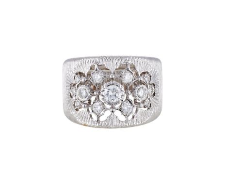 BUCCELLATI, A DIAMOND DRESS RINGThe tapered ring with a pierced lattice of graduated brilliant cut diamonds, approximately 0.