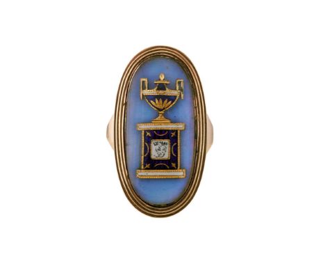 A GEORGE III ENAMELLED PANEL MOURNING RING CIRCA 1792The oval panel with opalescent enamelled ground with an applied blue and