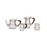 A FRENCH SILVER COLOURED FOUR PIECE BALUSTER TEA AND COFFEE SET