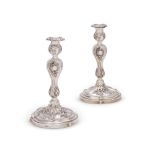 A PAIR OF RUSSIAN SILVER CANDLESTICKS