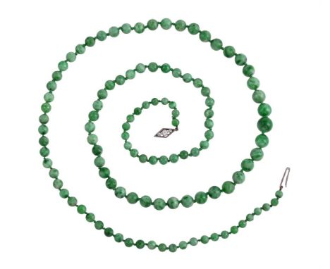 A SINGLE STRAND JADEITE JADE NECKLACEThe graduated jadeite jade beads on a knotted strand, to a pierced lozenge shaped clasp 