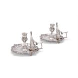 A PAIR OF GEORGE IV SILVER CHAMBERSTICKS